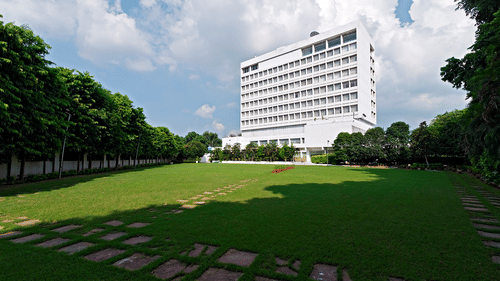 The main lawn at Clarks Avadh, a five star hotel in Lucknow, features its giant facade on a sunny day.
