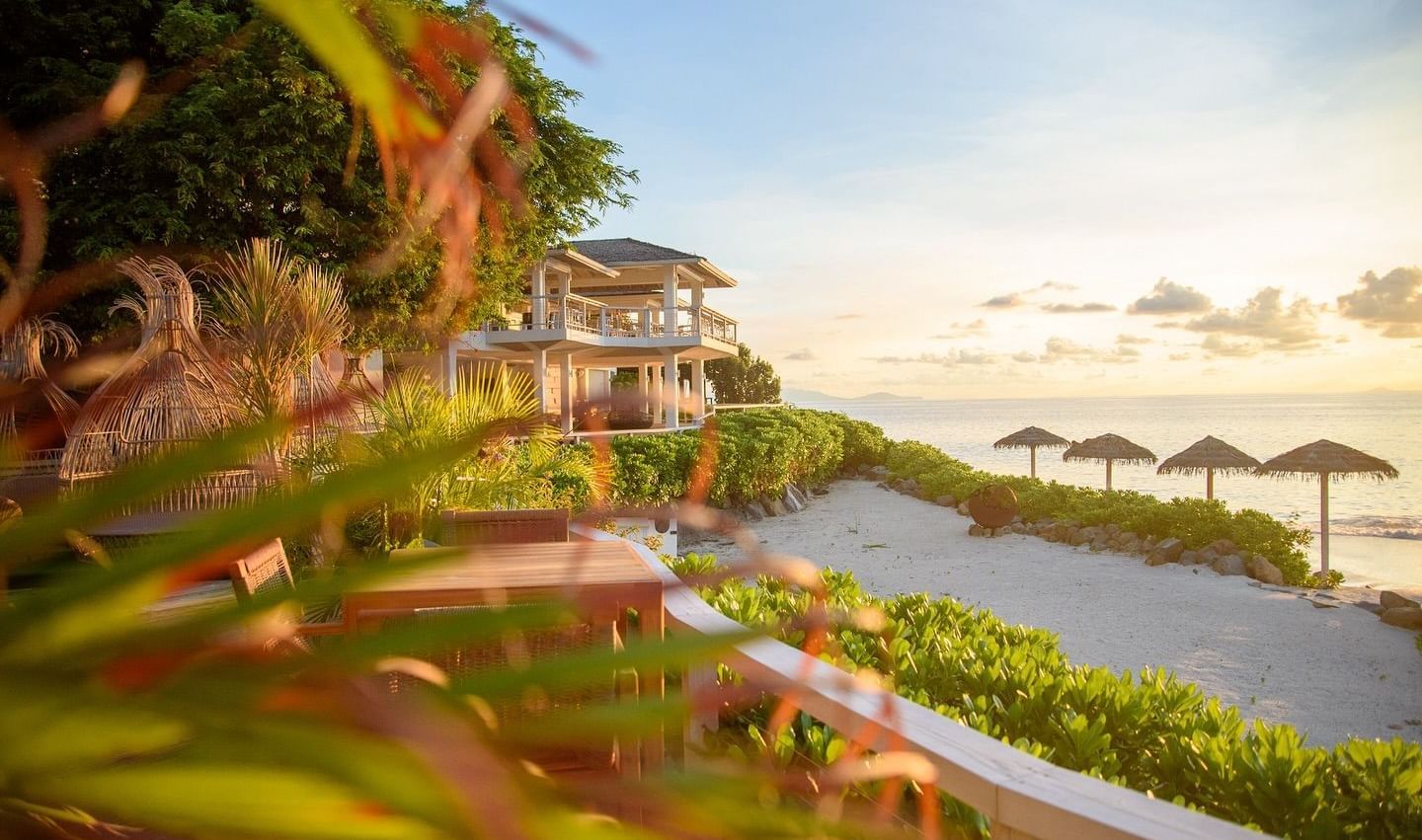 Scenic sunset view of villas overlooking the Caribbean Sea at Tamarind Hills Antigua – Resort & Villas