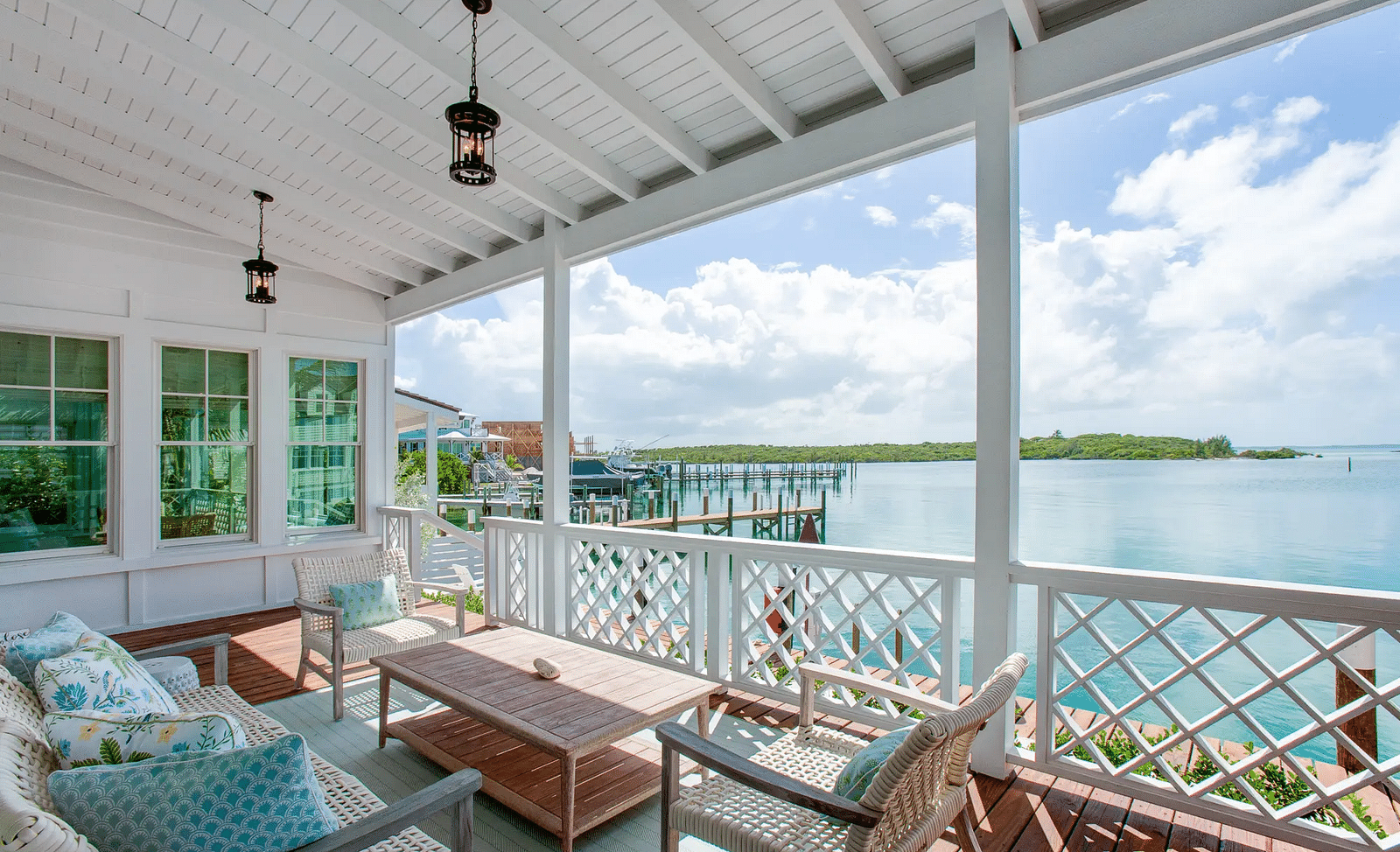 Covered outdoor lounge with a view of the ocean | Abaco Inn