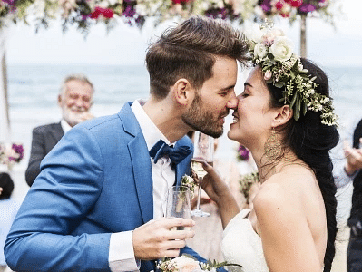 A couple getting hitched with a beach in the background - S Hotel Montego Bay, Jamaica