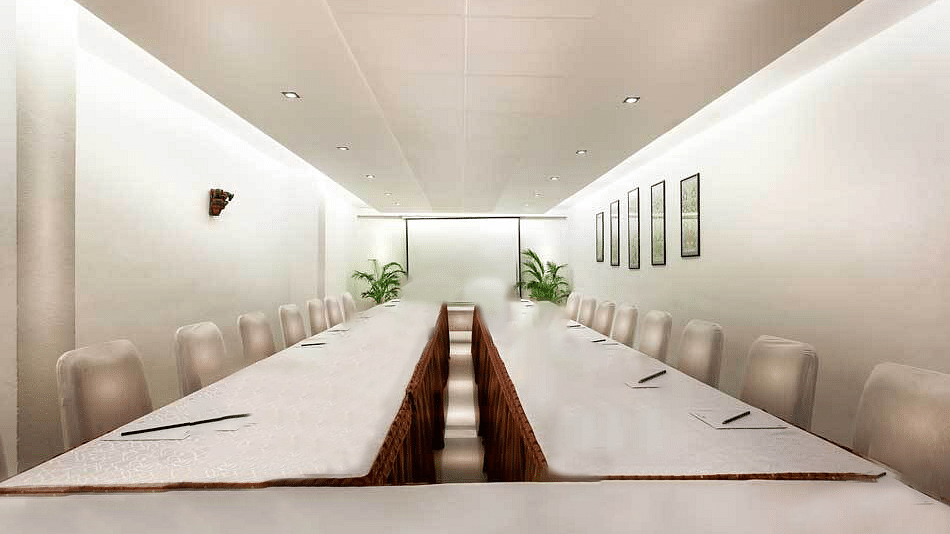 An image of the meeting hall with water bottles arranged on the table at  Regency Madurai by GRT Hotels