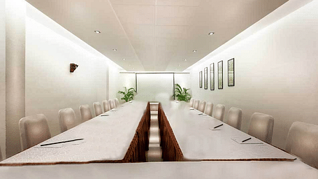 An image of the meeting hall with water bottles arranged on the table at  Regency Madurai by GRT Hotels