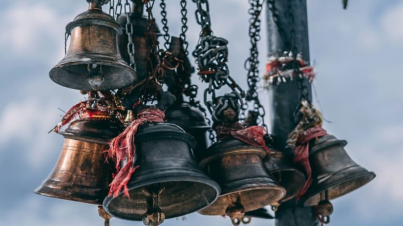 Temple bells that are hung on a pole