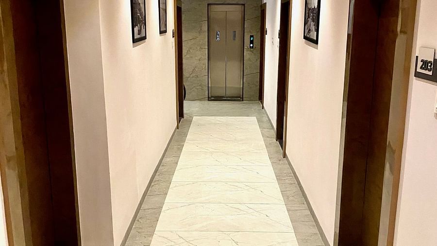 Corridor with doors on both sides  at Hotel Mumbai House, Indore
