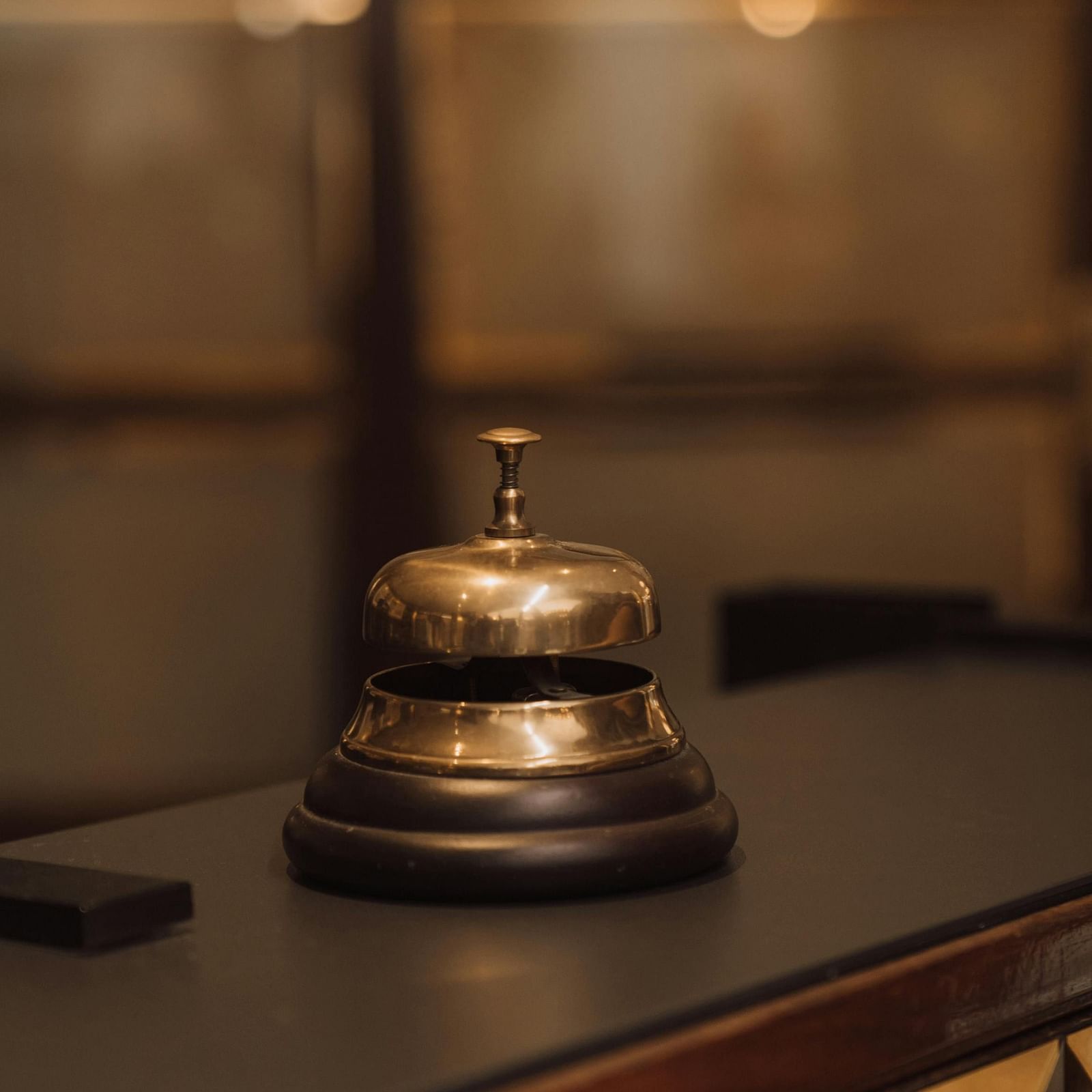 an image of front desk area with concierge bell 