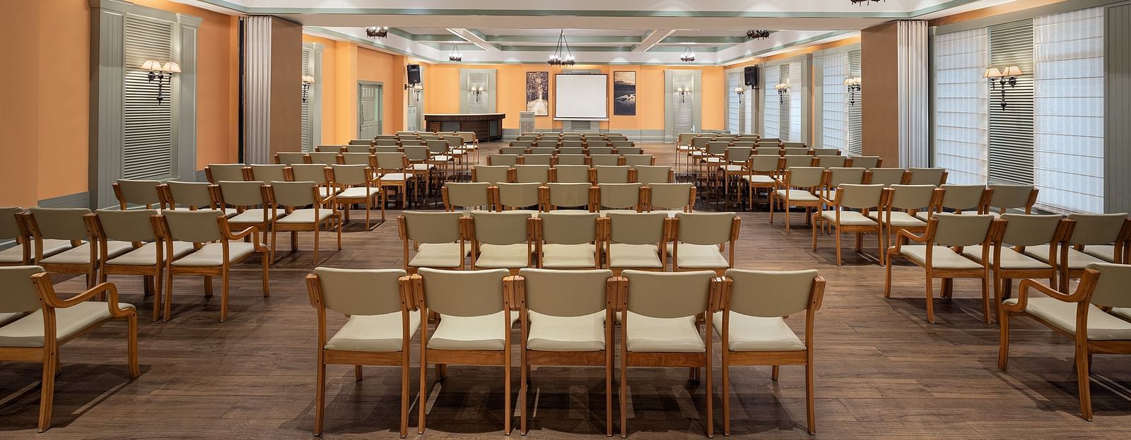 Elegant seating arrangement inside the hotel, featuring stylish hanging decor.