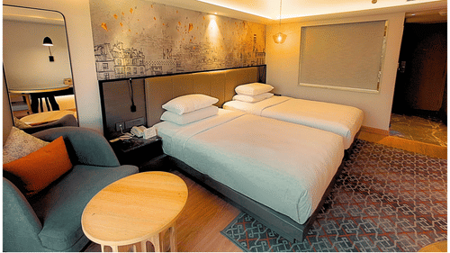 Serene Deluxe Twin Room with Soft Lighting