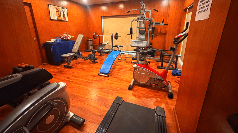 A wide angle shot of the gym at the Senses Hotel featuring various fitness equipment placed apart from each other.