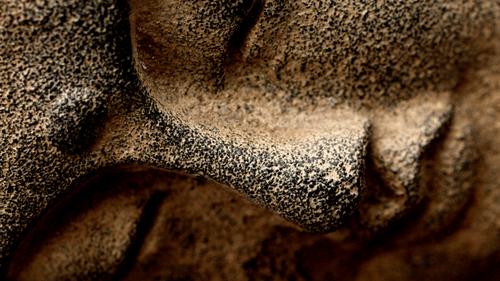 stone carving of a religious figure 3