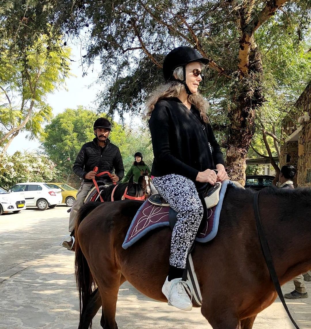 An image of a man riding a horse - Utsav Camp Sariska