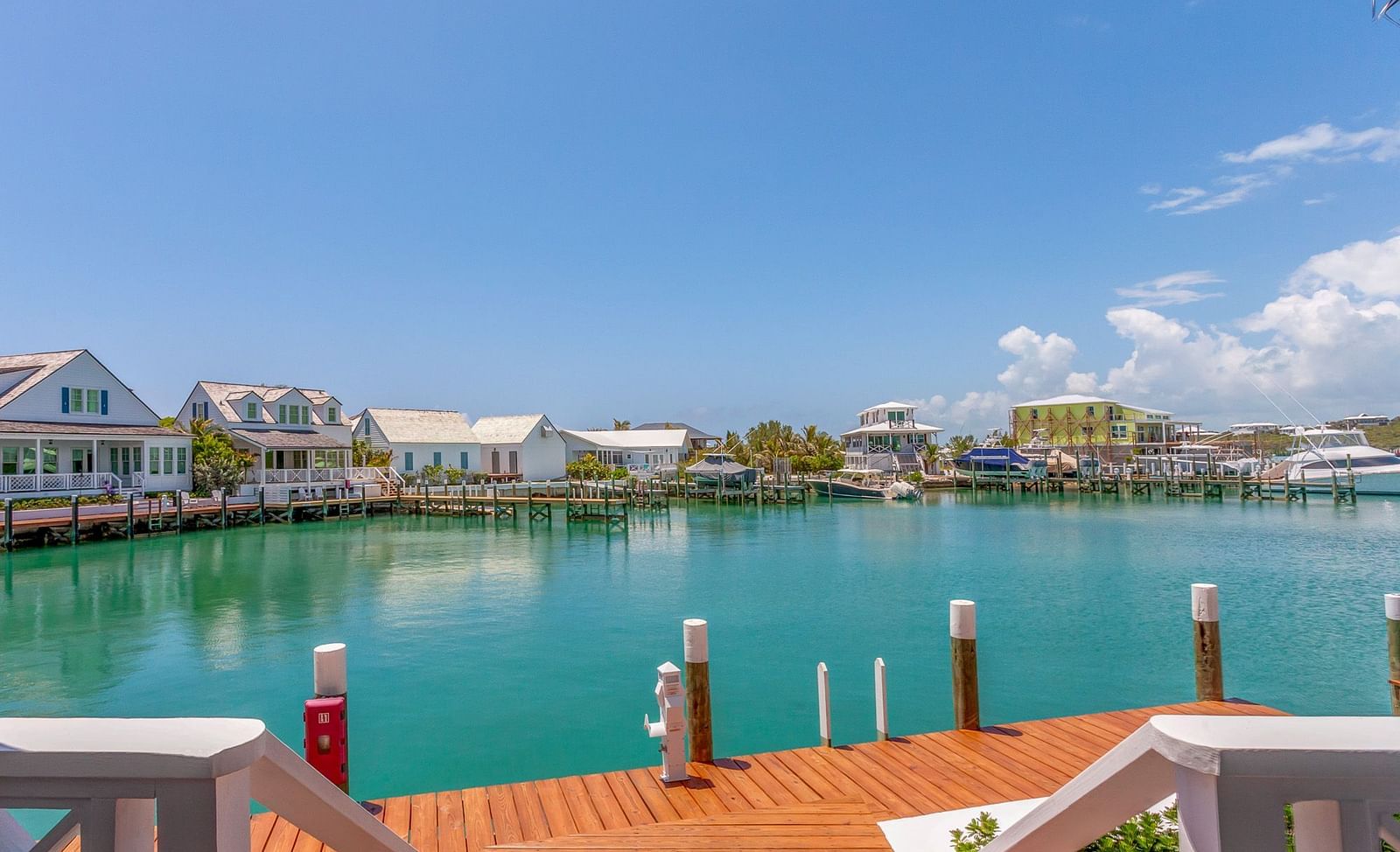 Wooden dock with the sea view at Abaco Inn.