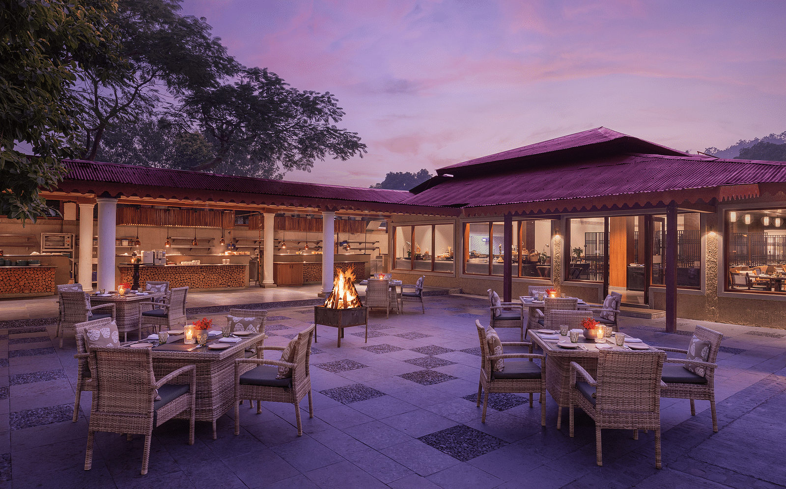 An image of an outdoor seating area with table and chairs near the villa -The Riverview Retreat,  Corbett