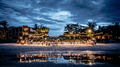 A well-lit beach in Goa during nightime