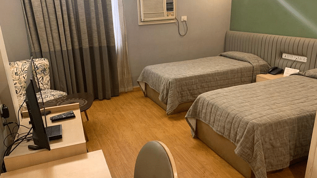 Twin Standard bedroom with LCD TV at Hotel Diplomat