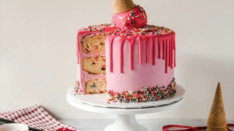 stawberry flavour Birthday cake decorated with ice cream cones