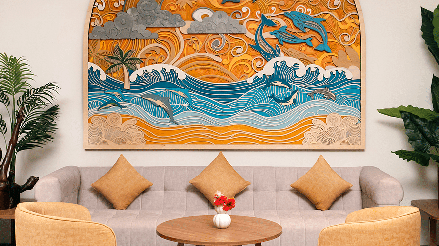 Sofas, accent chairs, a coffee table, and sea-inspired artwork adorn the lobby of Cloud9 Sarovar Premiere, Palolem Goa, creating a welcoming atmosphere