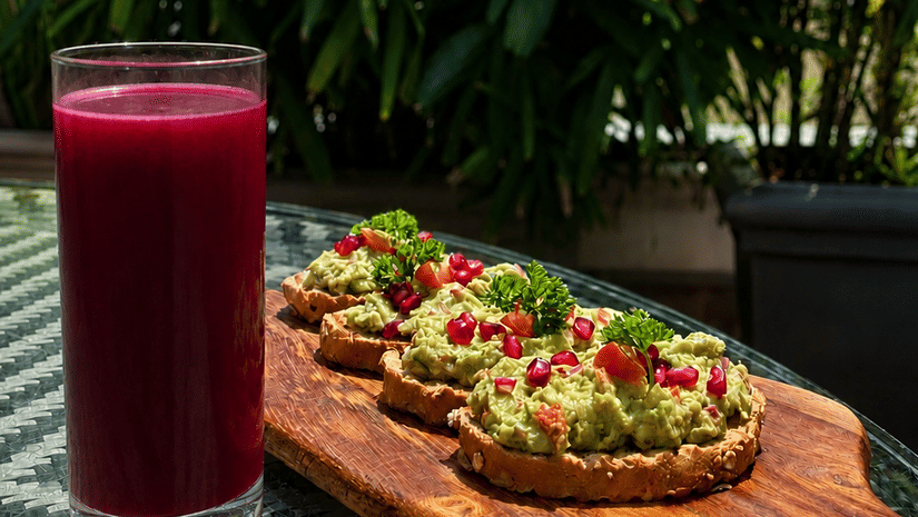 A healthy drink and snack placed on a table at Karma Lakelands.