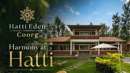 Villa exterior with a garden and umbrellas, promoting private villa living at Hatti Eden, Coorg.
