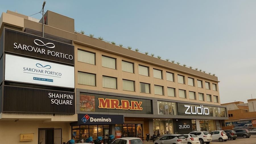 Facade image of Sarovar Portico, Hanumangarh during the day.