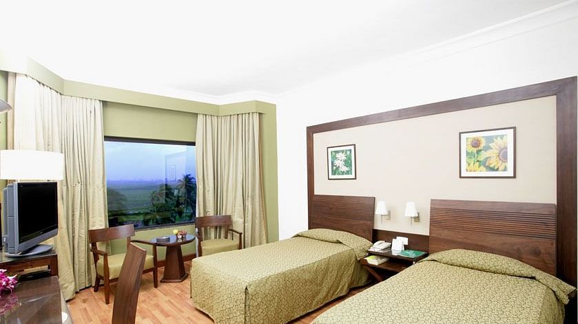 twin beds in the Deluxe Room