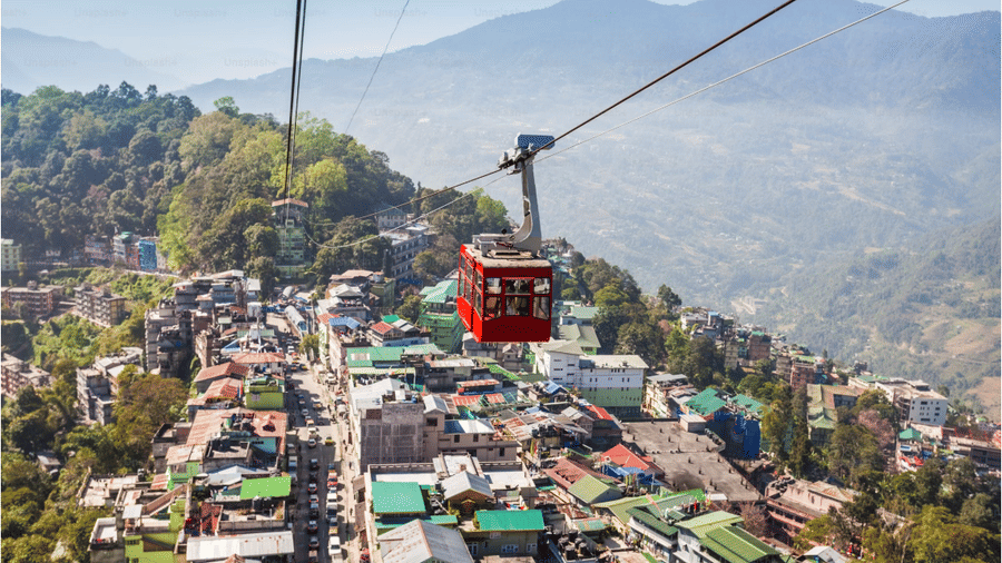 A view of a ropeway and picturesque view of Gangtok