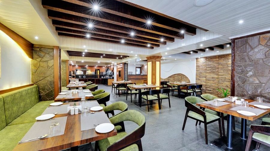 An image of Sumitel Queensyard restaurant with seating arrangements