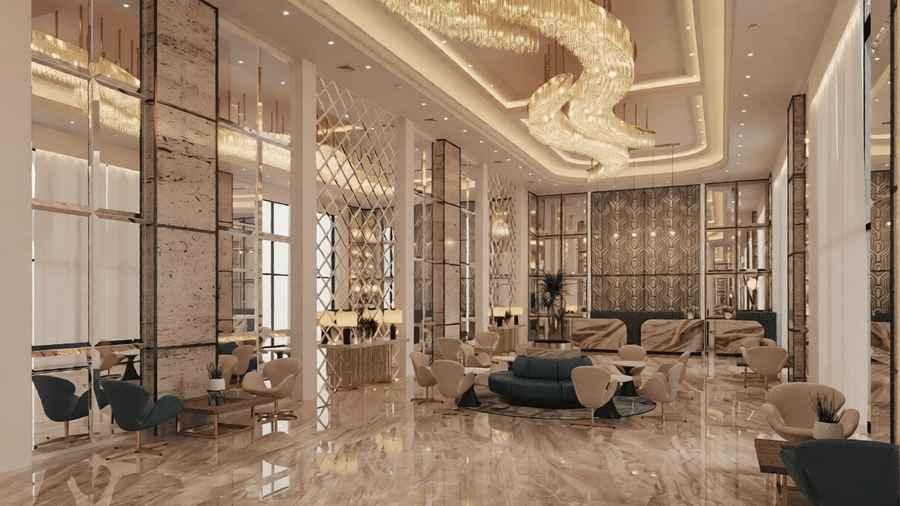 Corner view of the expansive lobby area at Essentia Luxury Hotel and Convention, Nagpur, with beautiful marble flooring along with ample of seating arrangements for the guests.