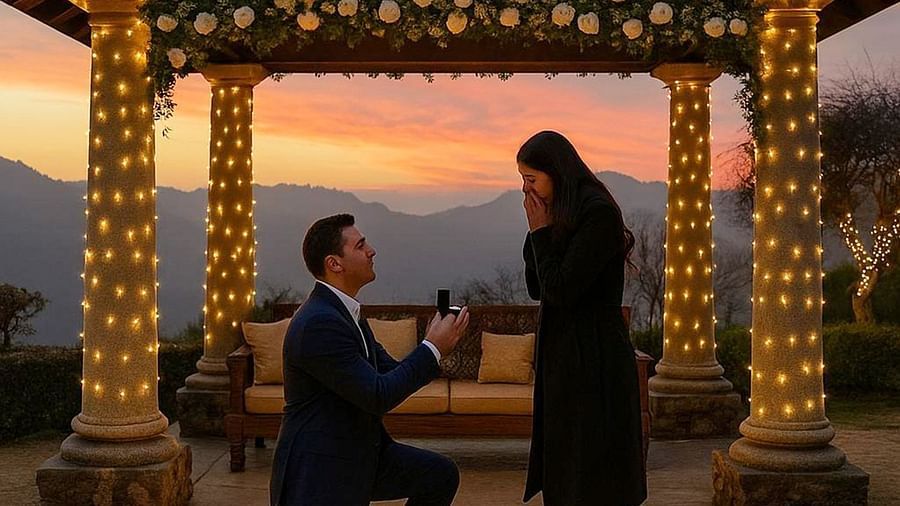  A surprise proposal at dusk under a lit-up gazebo at The Manor Sports & Wellness Hotel, with mountains in the background and glowing lights adding warmth.