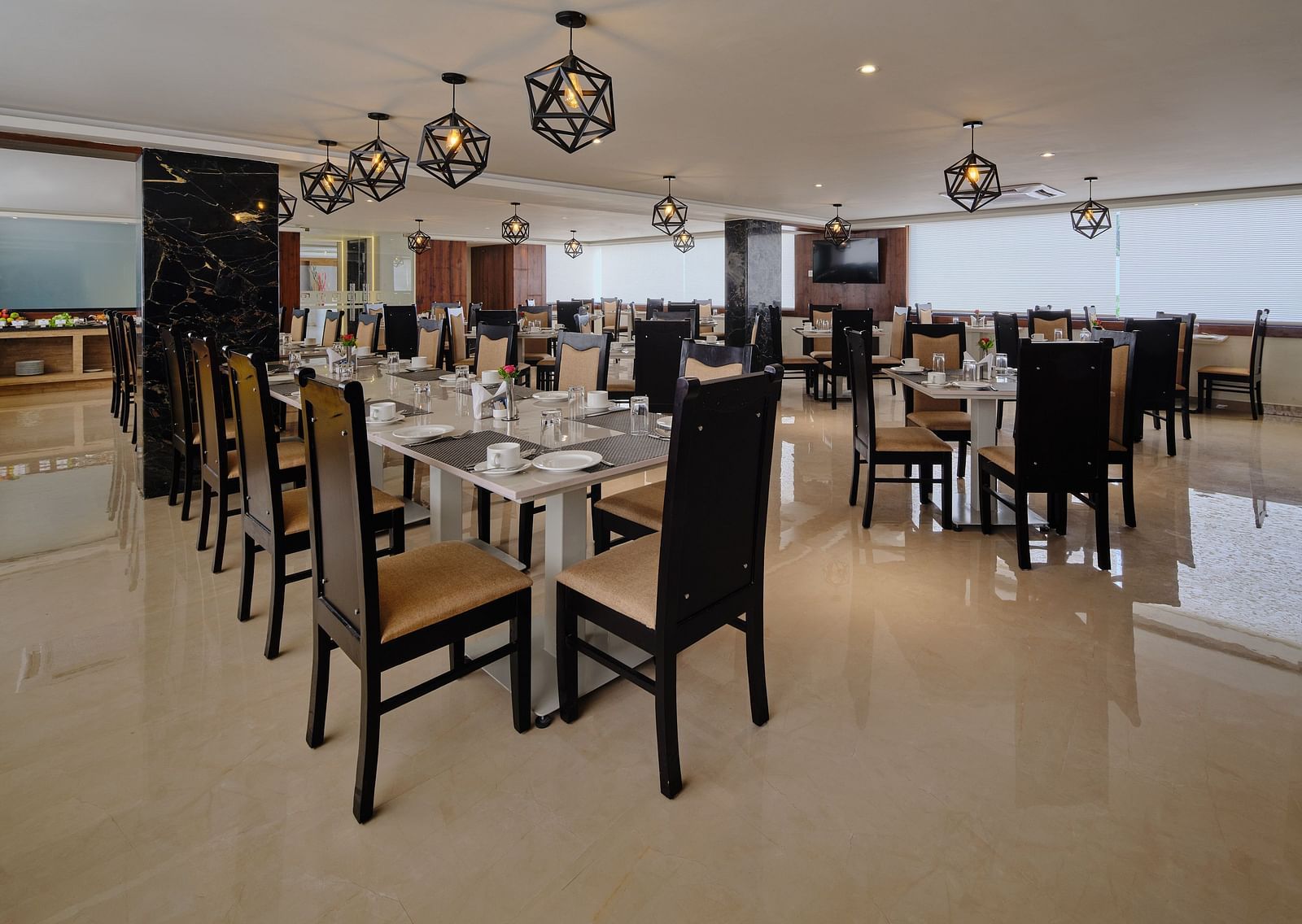 Dining arrangement at Blue Salt and Coffee at Essentia Premier Hotel, Chennai