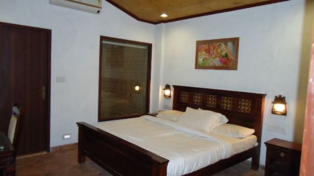 Adamo Matheran - Village - interior of the Family suite Bedroom
