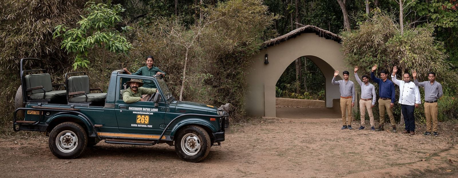 Staff at entry of Saccharum Safari Lodge, Balaghat