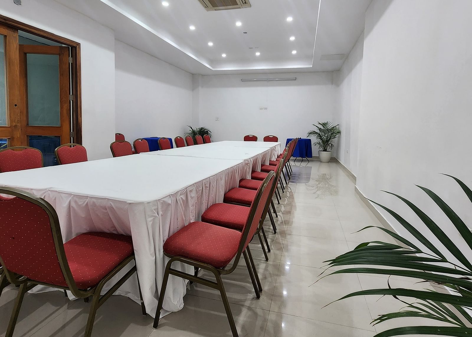 An image of a banquet hall with a table arranged in a long table arrangement - Hotel 39, Jamaica