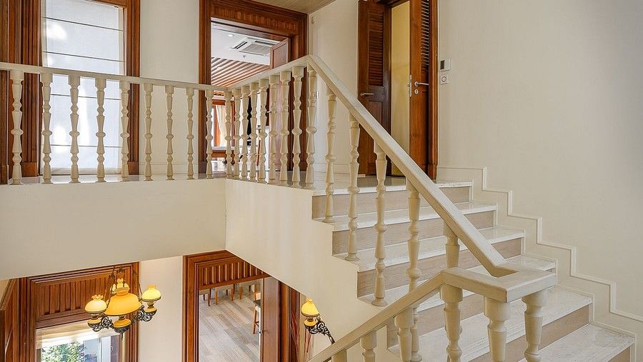 image of the staircase showcasing both the floors - three bedroom private pool villa