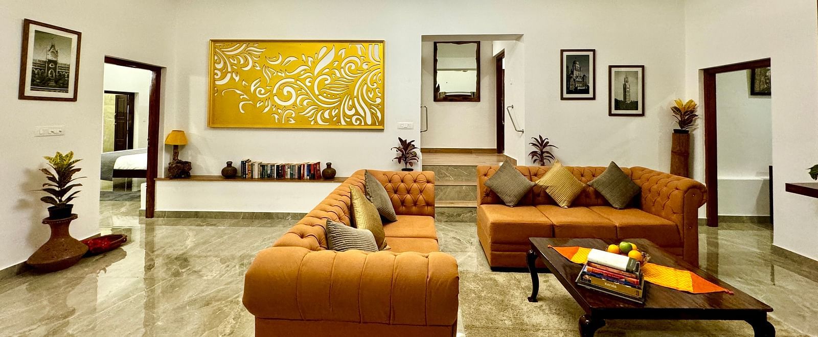 Bright and spacious villa living room with comfortable seating and modern decor - BluSalzz Collection - Tranquil Resort, Wayanad