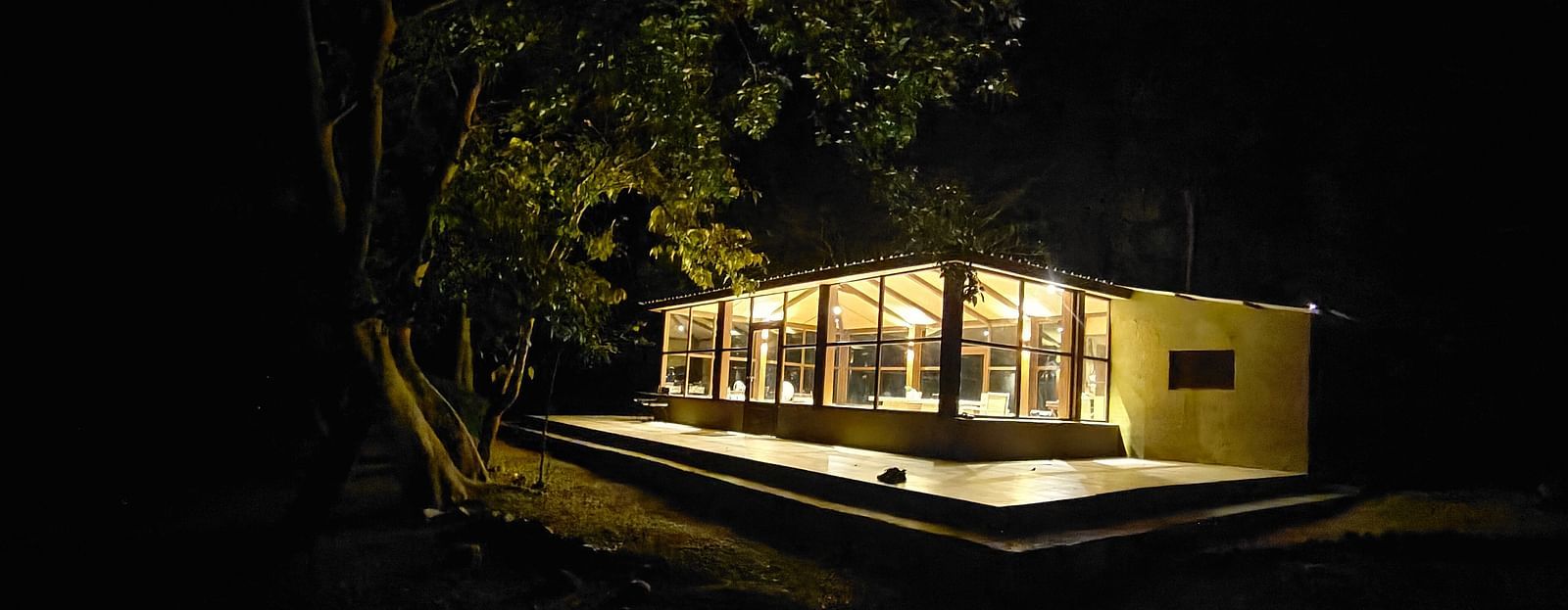 image of the facade of  a restaurant with trees outside - The Jamoon, Corbett
