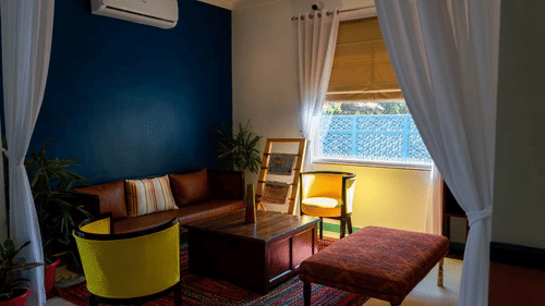 Sofa and coffee table in the lounge area - The Sierra - By The Lake