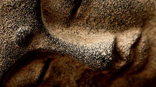 stone carving of a religious figure 3