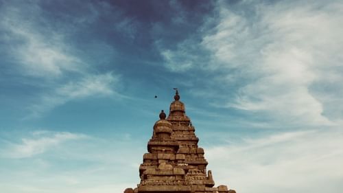 Neemrana's Coconut Alley -  a temple amidst azure blue sky