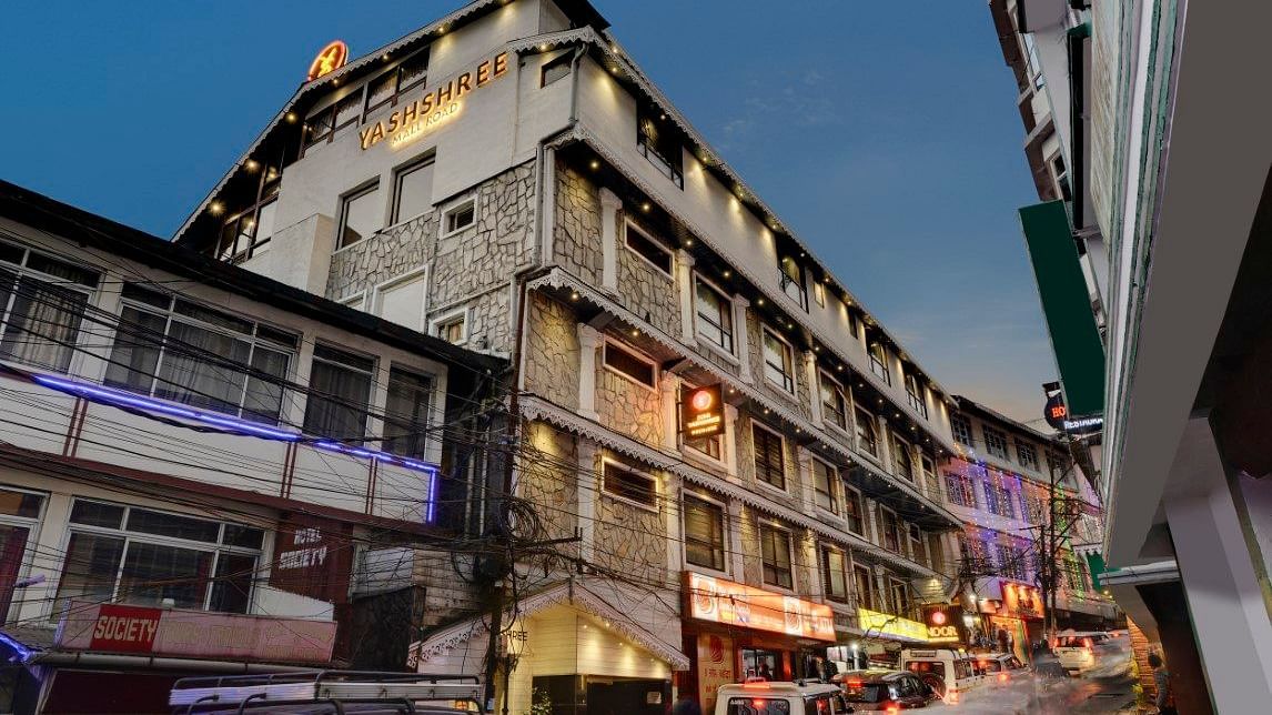 A facade image of Yashshree Mall Road, Darjeeling during dusk