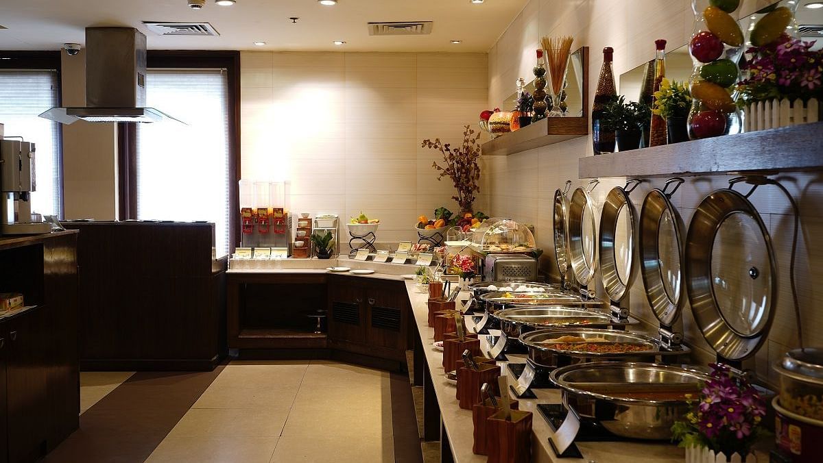 Buffet at Shervani Nehru Place, New Delhi featuring an elaborate breakfast spread