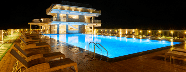 Night view of Swimming pool at Parakkat nature Hotel & resort, Munnar