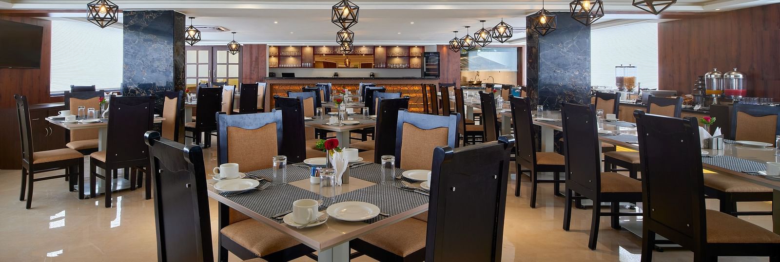 Dining arrangement at Blue Salt and Coffee at Essentia Premier Hotel, Chennai