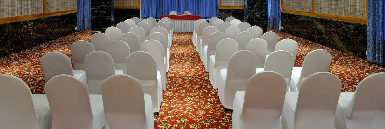 Seating arrangement in the Carnival banquet hall at Essentia Premier Hotel, Chennai.