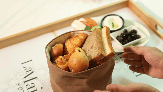 A breakfast tray with pastries being served in-room at La Maison Hotel, Doha.