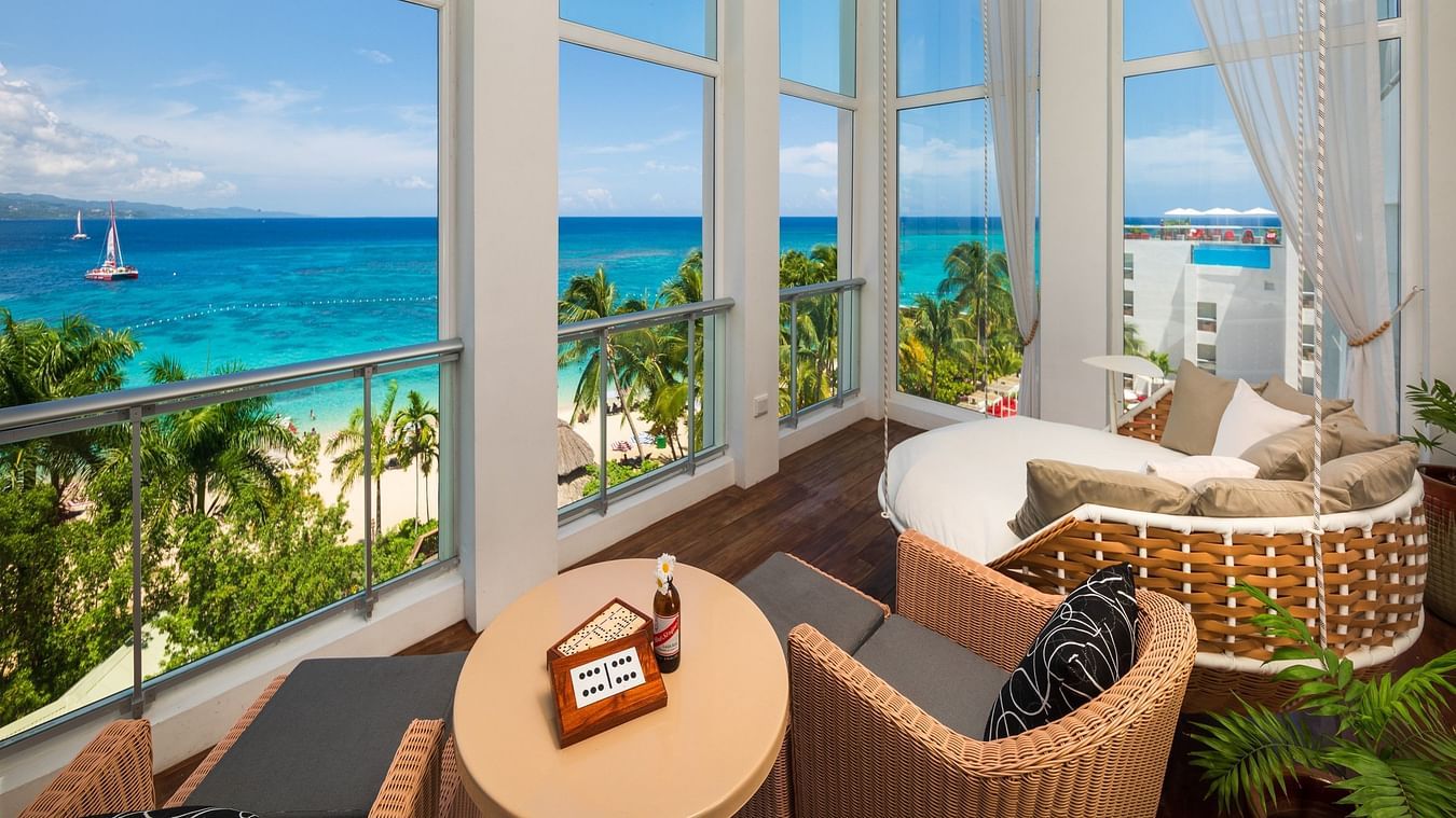 A seating area facing the beach in our Montego Bay suite - S Hotel Montego Bay, Jamaica