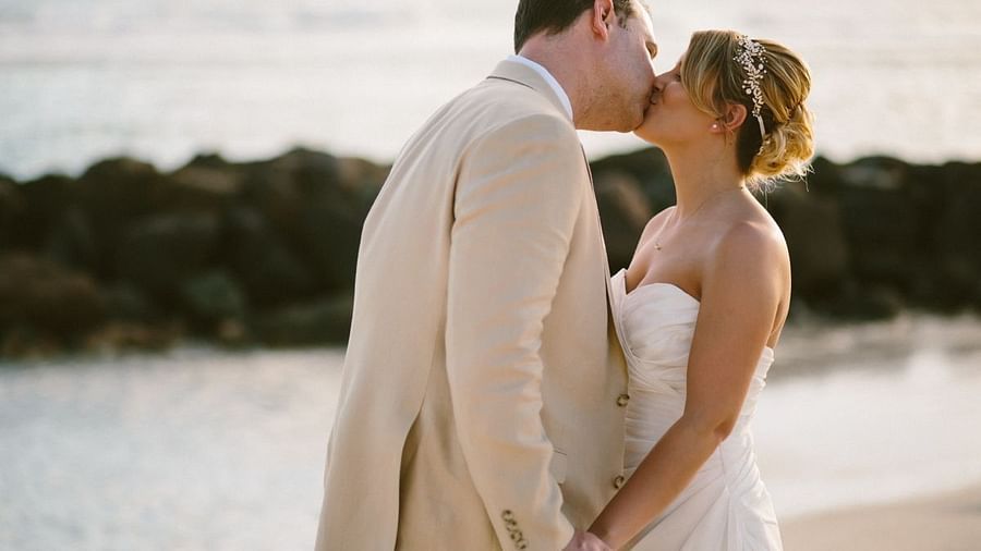 A couple kising after getting married - The Soco Hotel Barbados