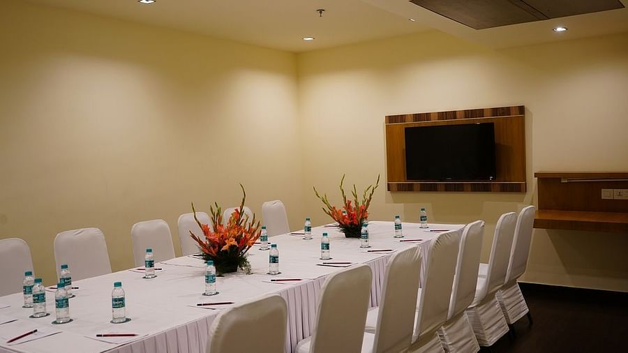 Board Room featuring audio & visual facility and elegant seating arrangements at Shervani Nehru Place, New Delhi