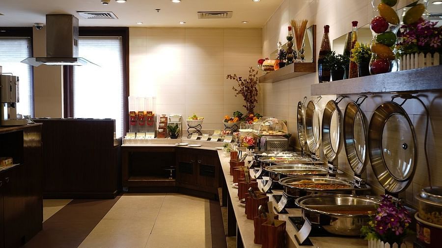 Buffet at Shervani Nehru Place, New Delhi featuring an elaborate breakfast spread