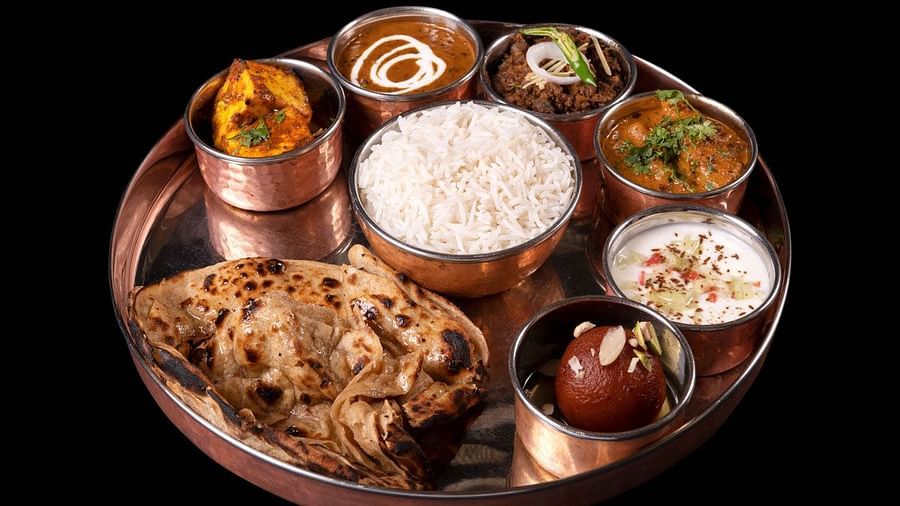 A platter with a variety of food at the Dhaba at The Claridges New Delhi