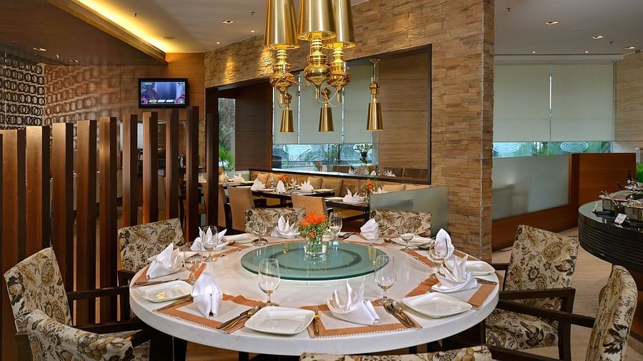 White Violet Restaurant at Hotel Majestic Court Sarovar Portico Navi Mumbai 6